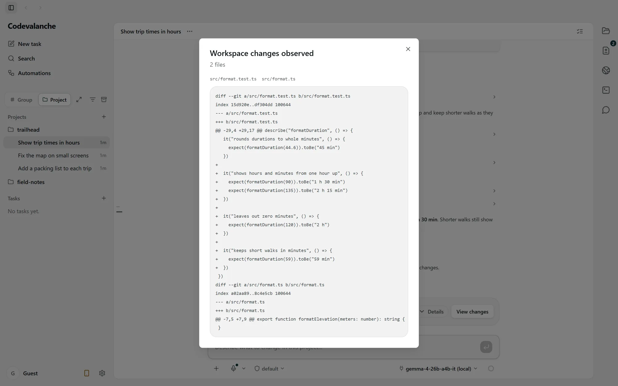 Tampilan perubahan di Codevalanche, menampilkan perubahan pada dua file yang diedit.